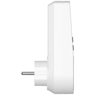 A side view of a white plug adapter being inserted into a power socket.