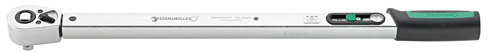 A silver torque wrench with a black handle and green indicator on the scale. Primarily used for precise fastening.