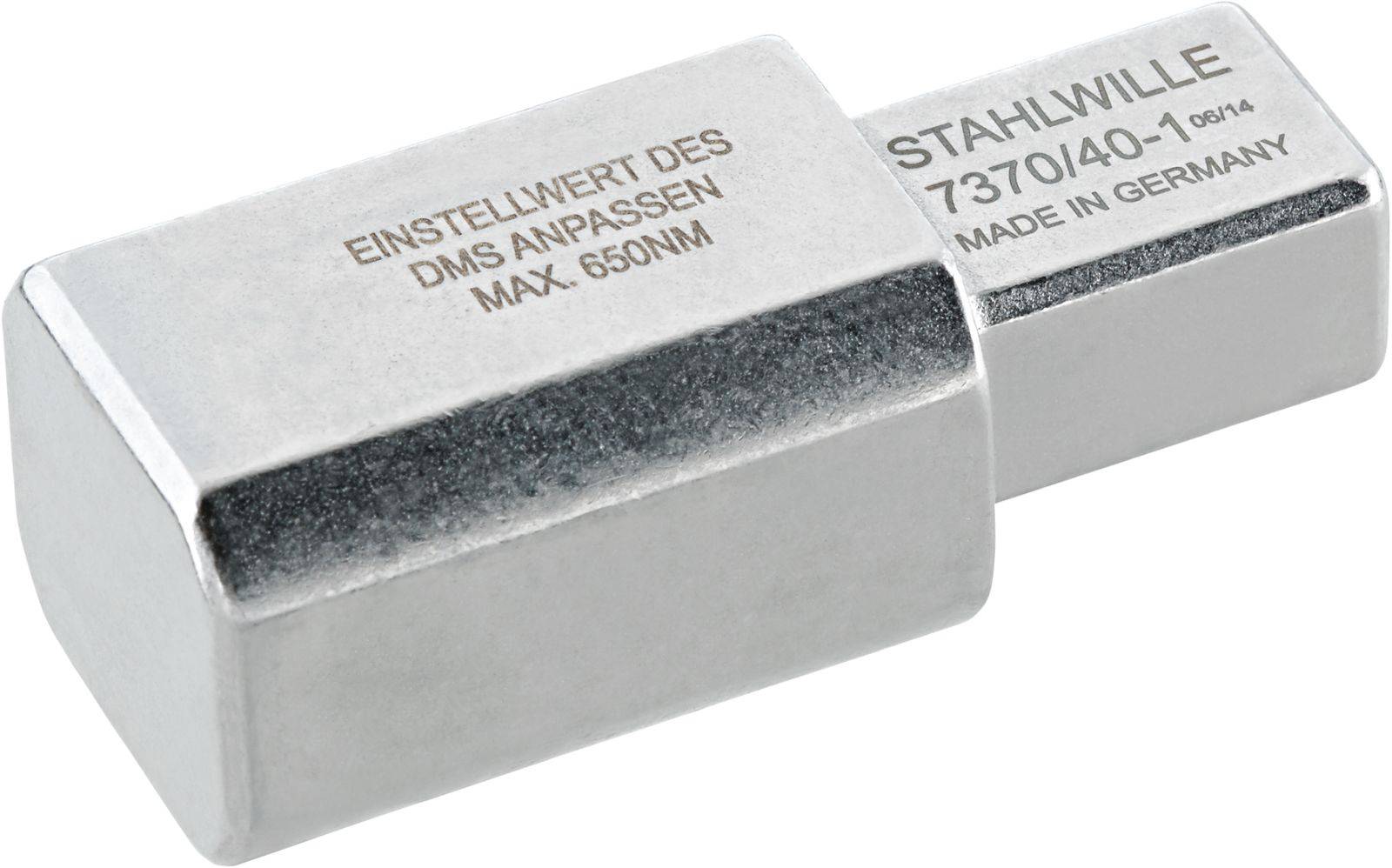 Metal block with engraving 'Adjust strain gauge setting, max. 650Nm' and 'Stahlwille 7370/40-1/0404, Made in Germany'.
