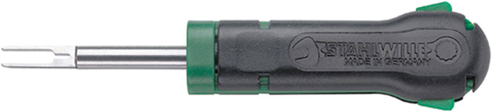 A black and green de-isolator with the label 'Stahlwille Made in Germany' and a U-shaped metal tip on the right.