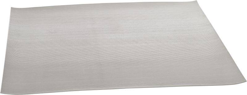 A grey, rectangular yoga mat lies flat on the floor. It has a textured surface.