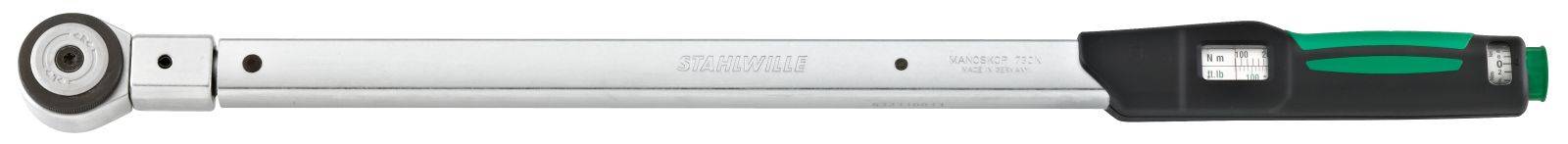 Torque wrench with scale, green and black handle, metal rod with calibrations, used for precise tightening of screws.