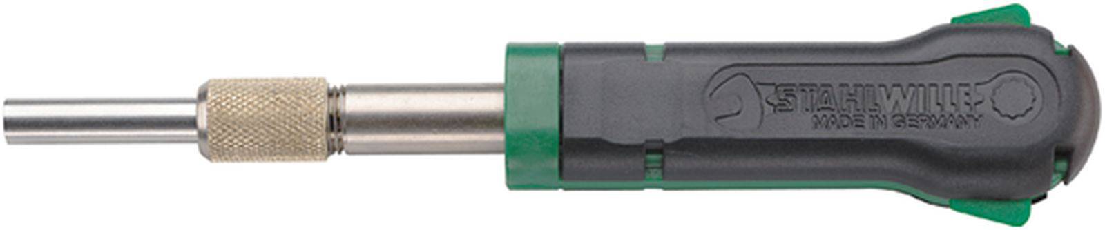 Hand screwdriver with green-black handle and adjustable shaft. Tool for precise screw insertion.
