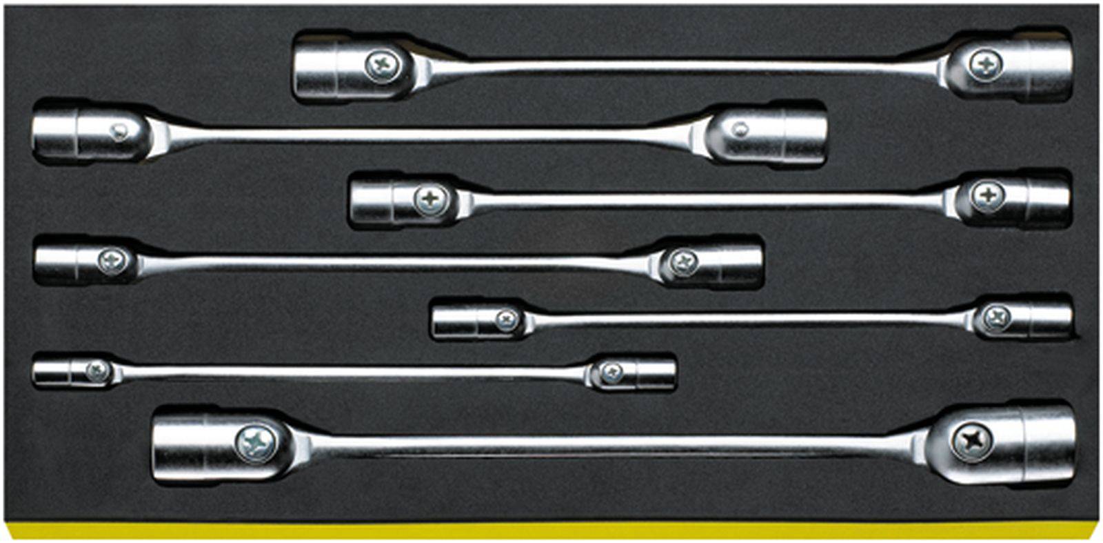A set of seven socket extension bars, in various lengths, on a black background in a tool assortment.