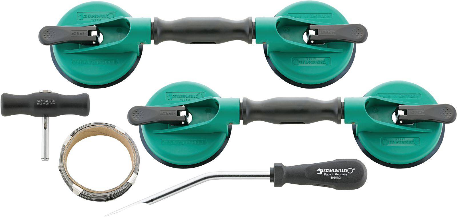 Two green vacuum suction lifters with black handles, a T-shaped handle, a metal ring and a screwdriver for assembly work.