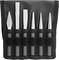 A tool set with five metal tools in a black bag, including flat, cross, and round chisels, arranged neatly side by side.