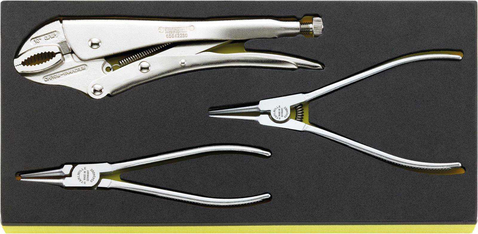 'Three different pliers in a tool holder: top gripping pliers, middle curved long-nose pliers, bottom straight long-nose pliers.'