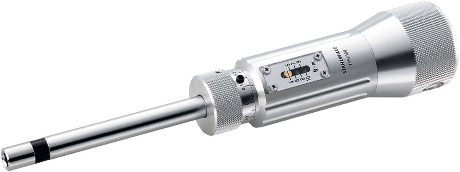A silver, cylindrical measuring instrument with a scale and markings, used for precise measurement in technical applications.