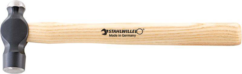 A hammer with a wooden handle and black head, with 'Stahlwille Made in Germany' printed on the handle.