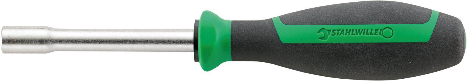 A screwdriver with a green and black handle and a metal tip lies horizontally.