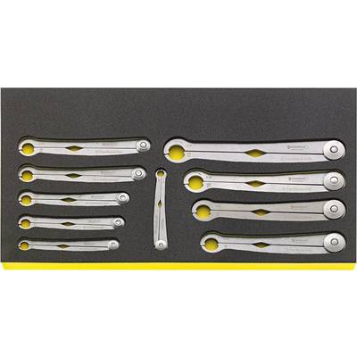 A set of ratchet ring spanners in various sizes lies in a foam insert. Each ratchet has two ends.