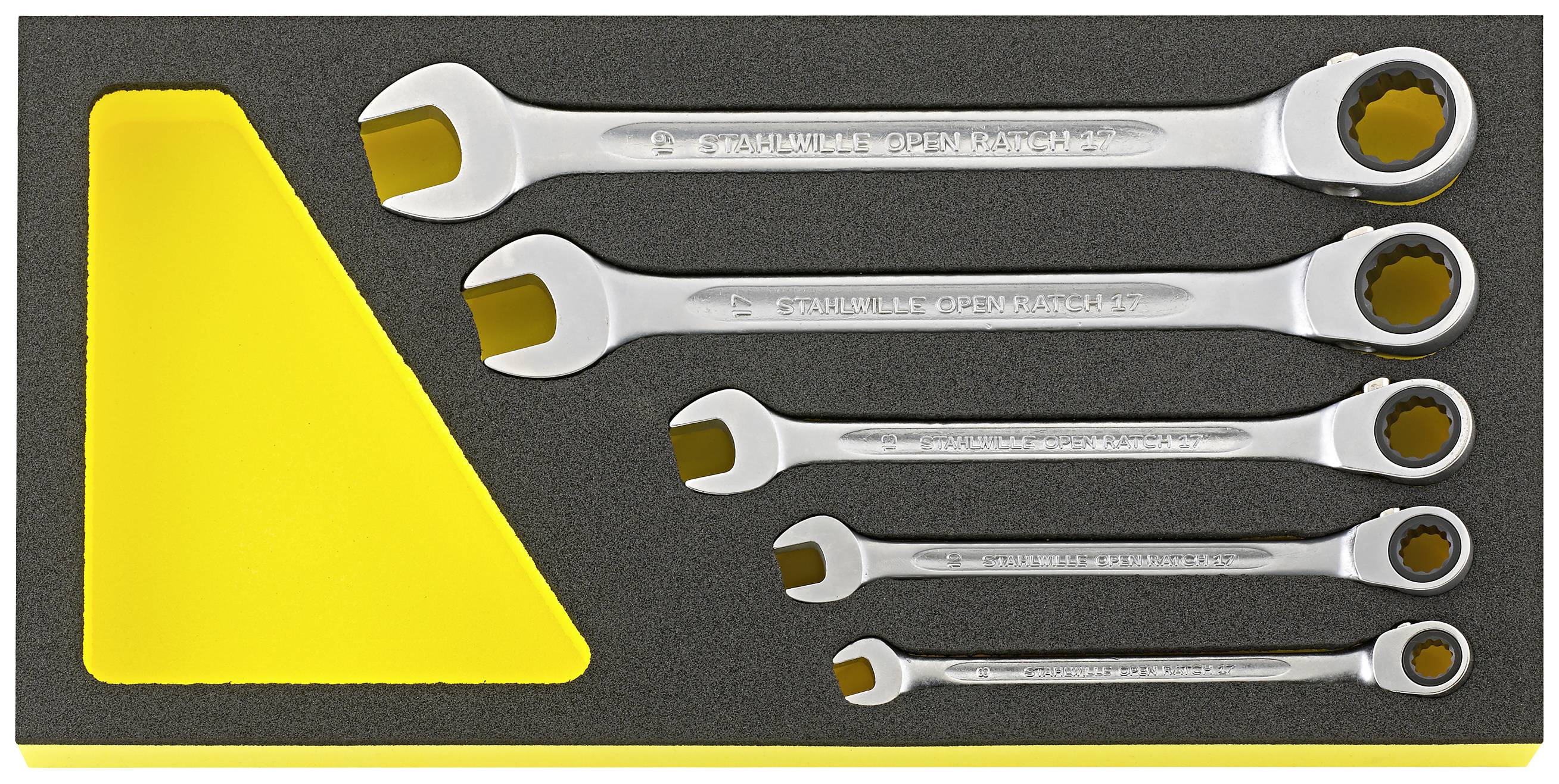 Five ring spanners in foam insert; sizes sorted, from large to small.