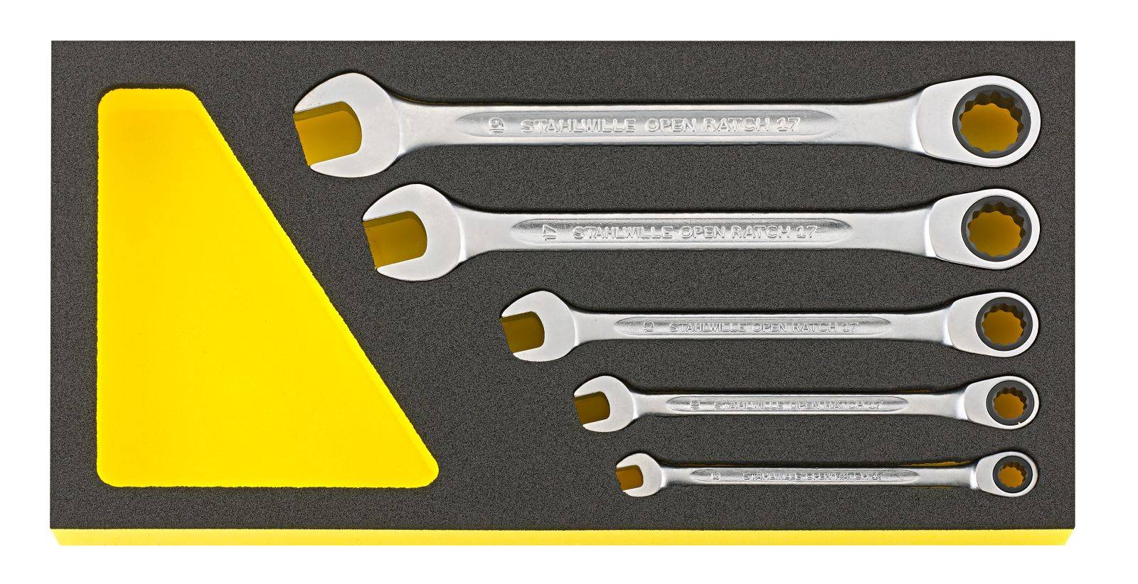 A set of five ring spanners in different sizes, housed in a foam insert with a yellow triangle for secure storage.