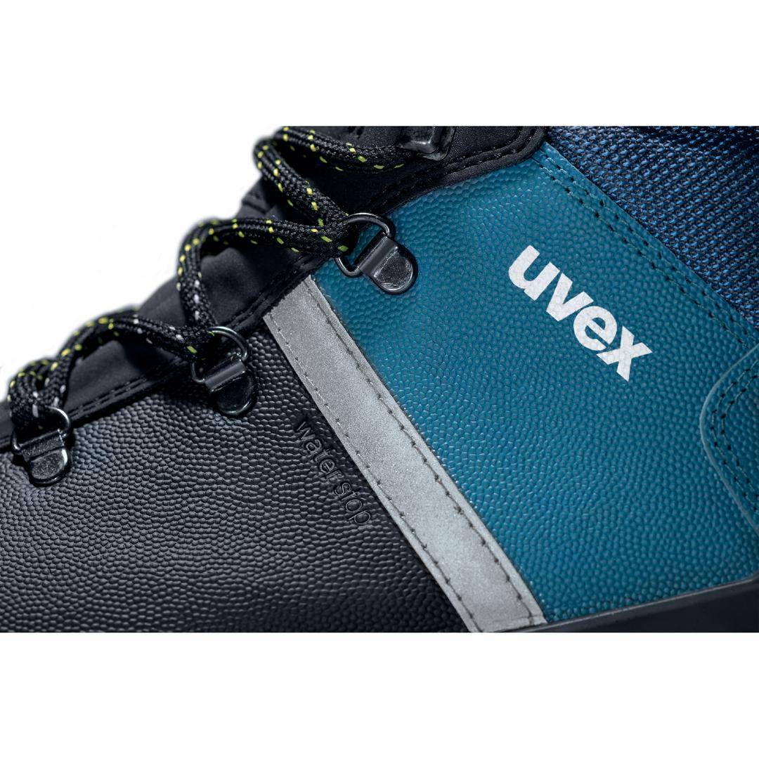 Close-up of a black and blue shoe with white stitching and the 'uvex' inscription.