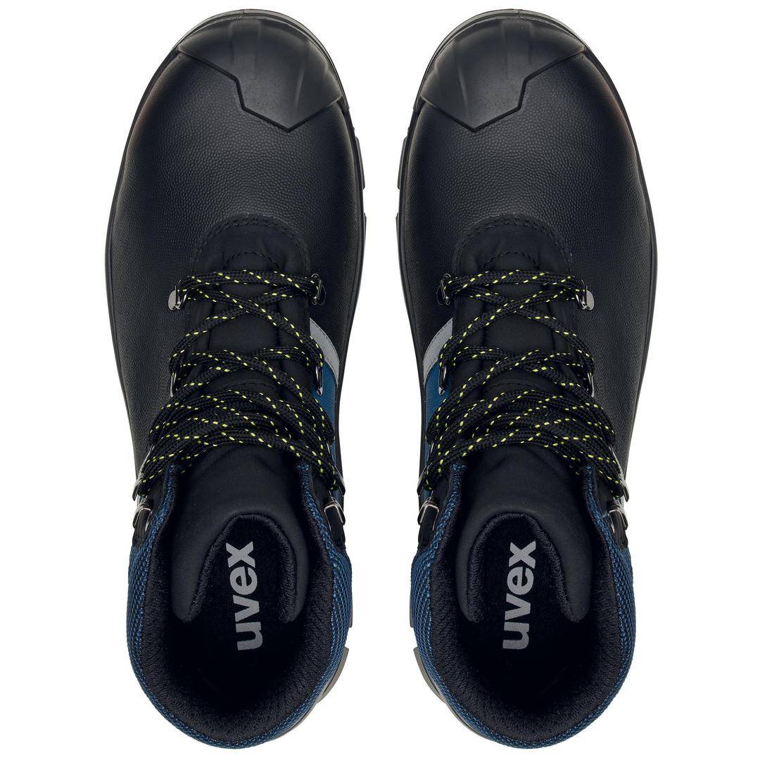 Two black safety shoes viewed from above, with blue lining and yellow-black spotted shoelaces. 'Uvex' brand logo in the heel area.