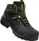 Black safety boots with yellow lace eyelets and reinforcements, with a red 'HECKEL' logo on the side, robust design for workplace protection.