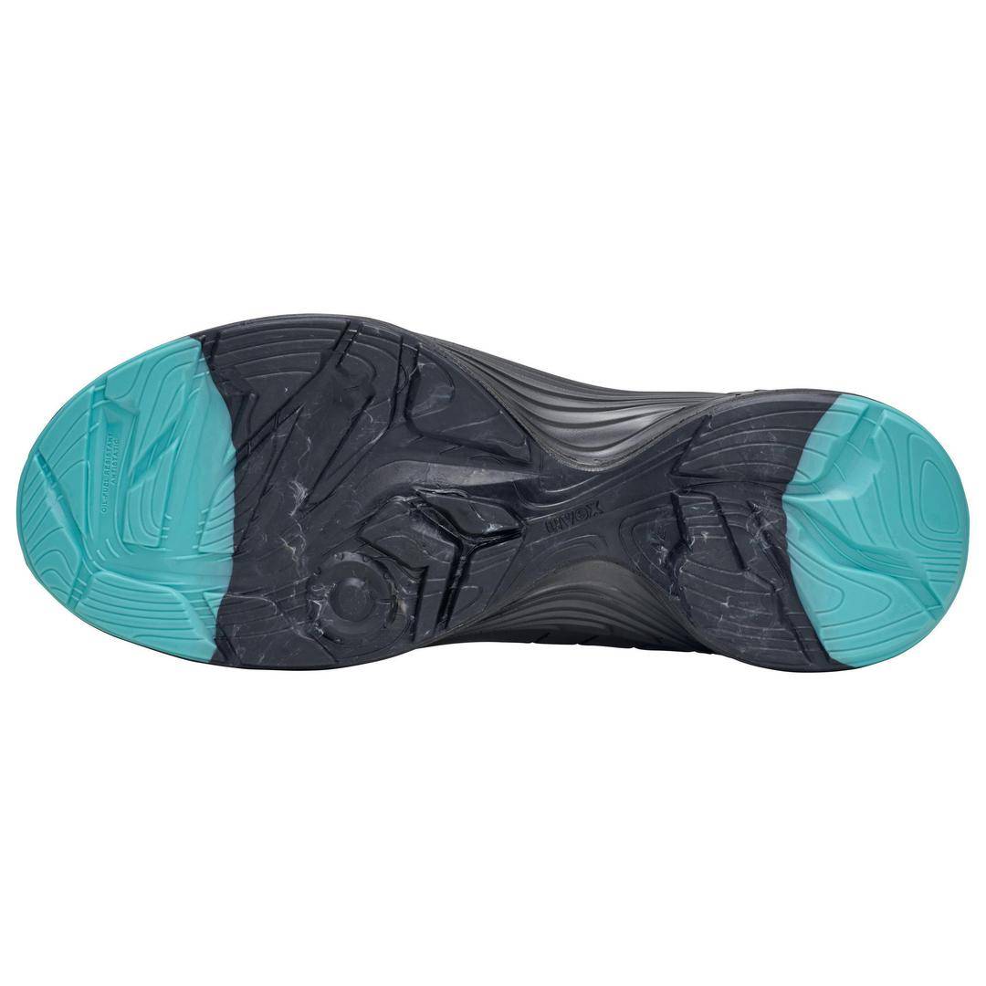 Trainer sole, showing a unique, wear-resistant design with blue and black areas for enhanced grip.