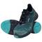 Two dark green trainers with a turquoise sole. One trainer is positioned at an angle, with the other lying beside it showing its sole.
