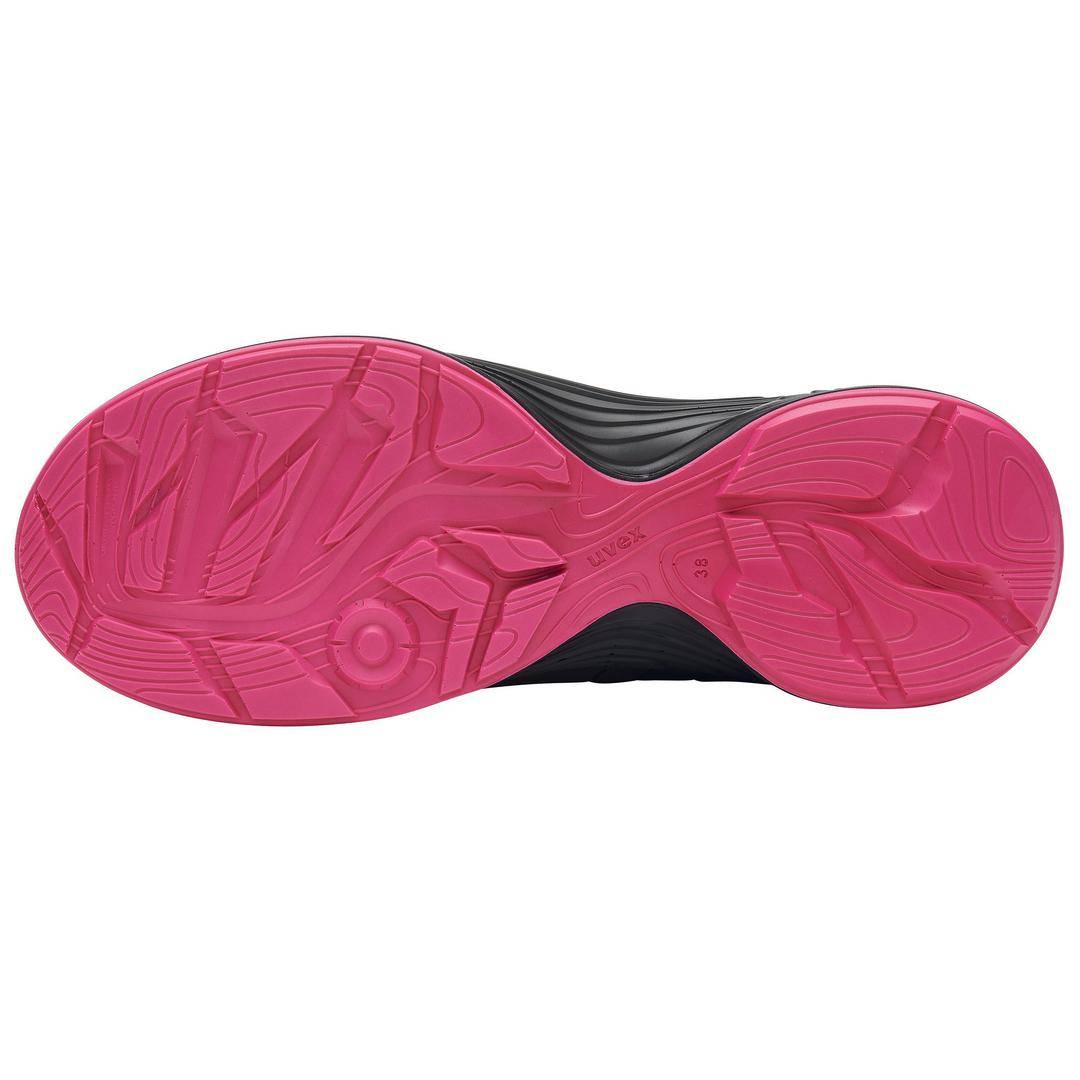 The image shows the sole of a shoe with a distinctive pink tread pattern on a black background.