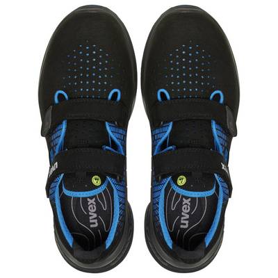 Black safety shoes viewed from above with blue accents and velcro fastenings, breathable surface texture visible.