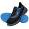 Black trainer with blue details and a blue sole, side view. The shoe features a modern design with laces.