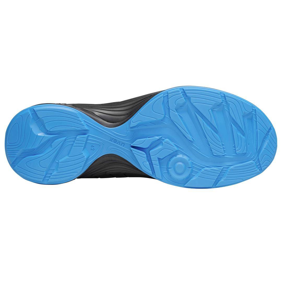 The image shows the blue sole of a sports shoe. The structure and pattern are clearly visible, which provides good grip.