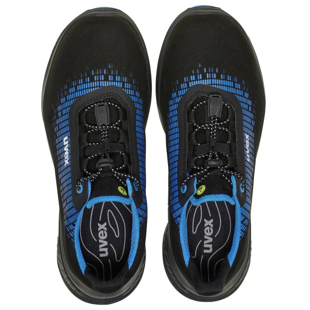 Black safety shoes from above, with blue patterns and laces, showcasing modern design and protective features.