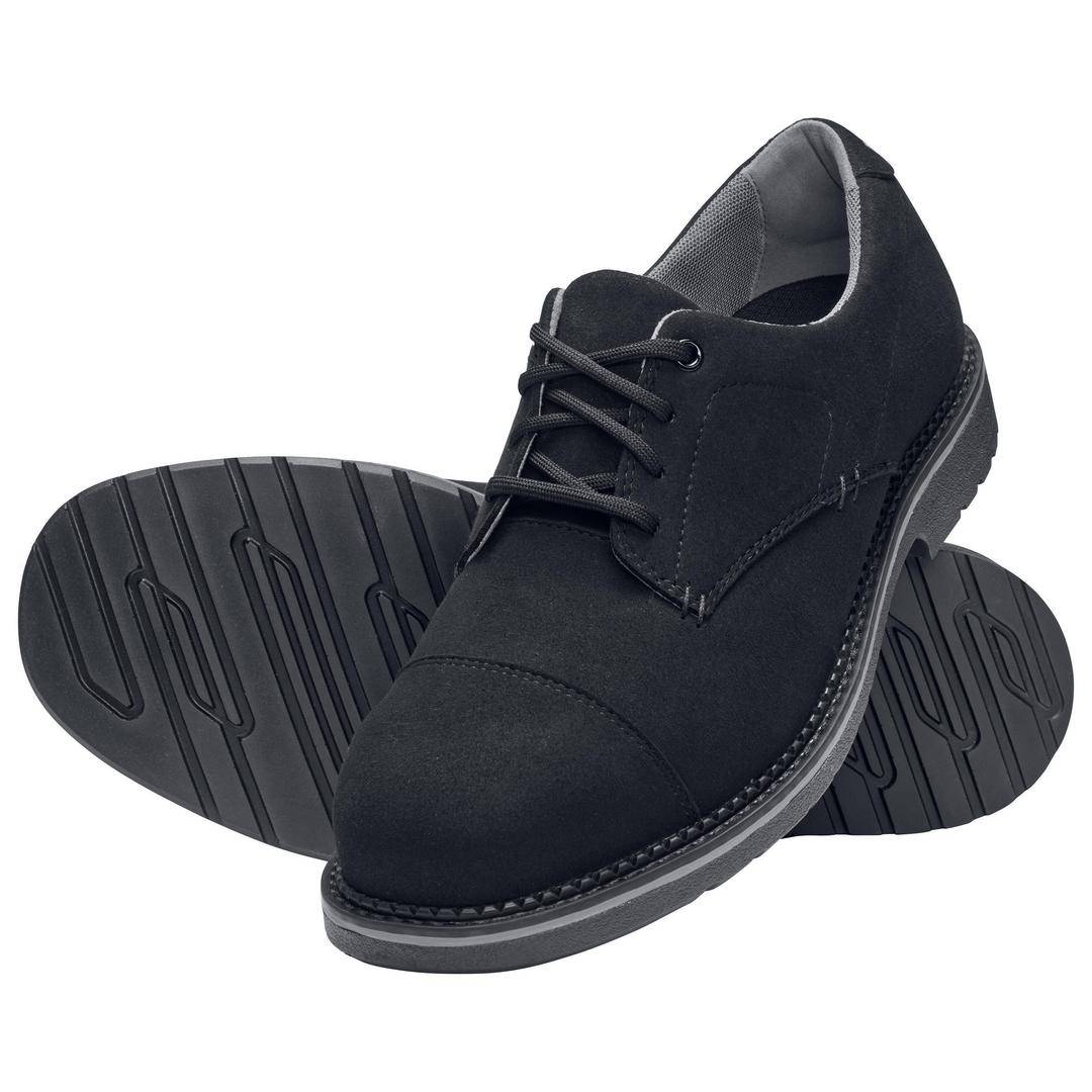 A pair of black, elegant men's lace-up shoes, with one sole slightly showing its profile.