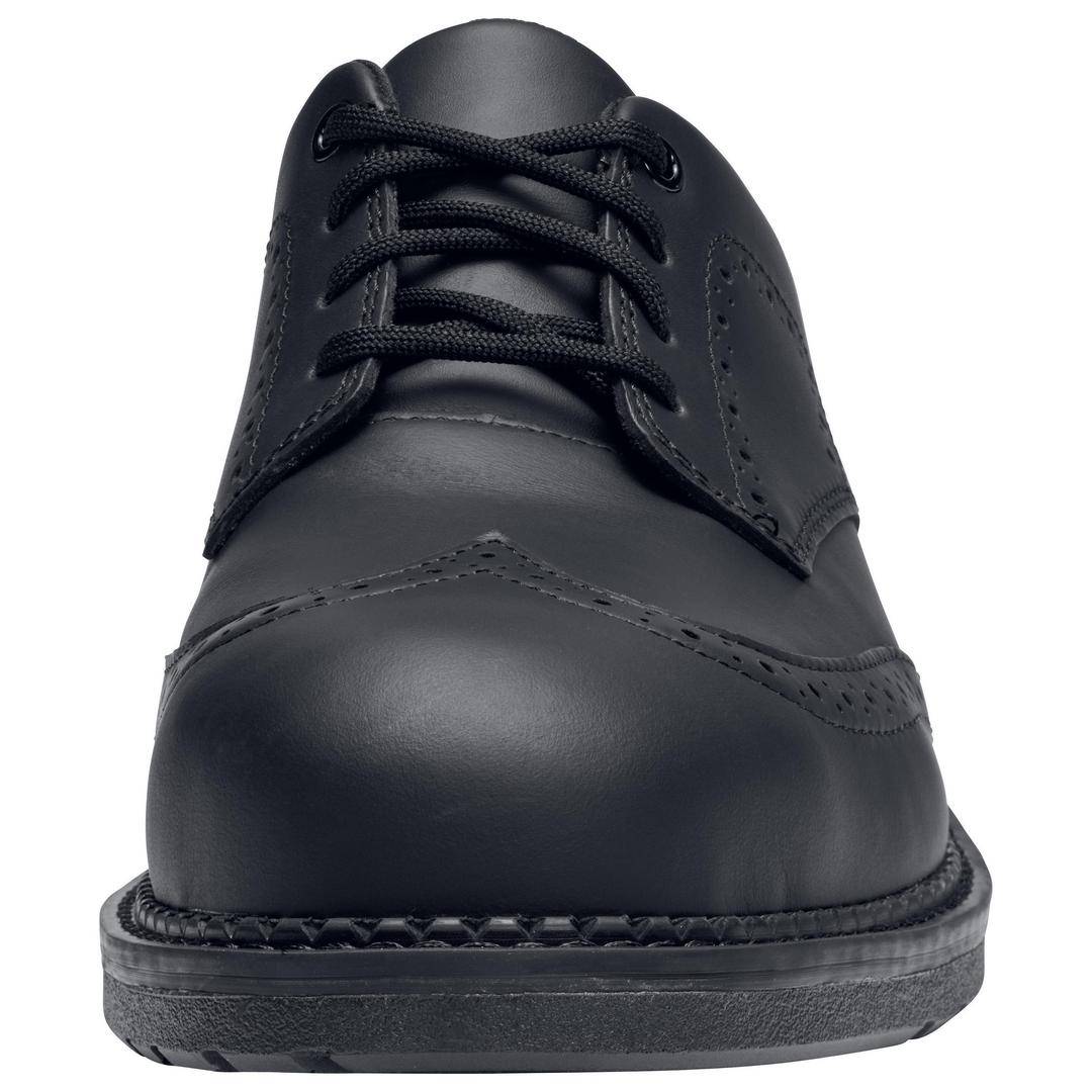 The black, closed leather shoe is viewed from the front. With decorative stitching and laces. Suitable for formal occasions.