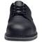 Black leather shoe viewed from the front, laced with black shoelaces, robust sole, classic design for formal occasions.