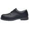 Black, lace-up work shoe with a flat sole, robust design and padded inner lining, photographed from the side.