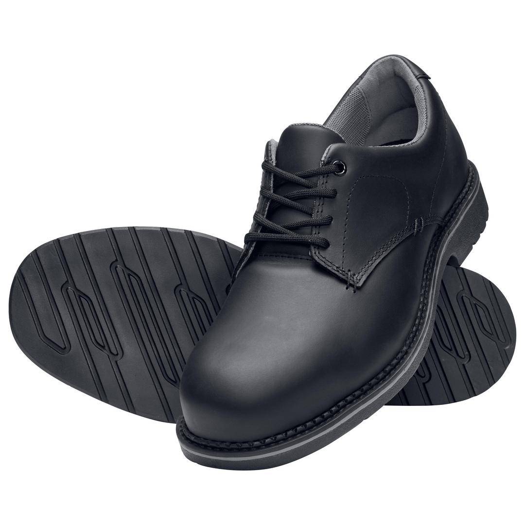 Black leather shoes with non-slip sole. The right shoe is standing upright, while the left shoe is positioned on its side, revealing the sole structure.