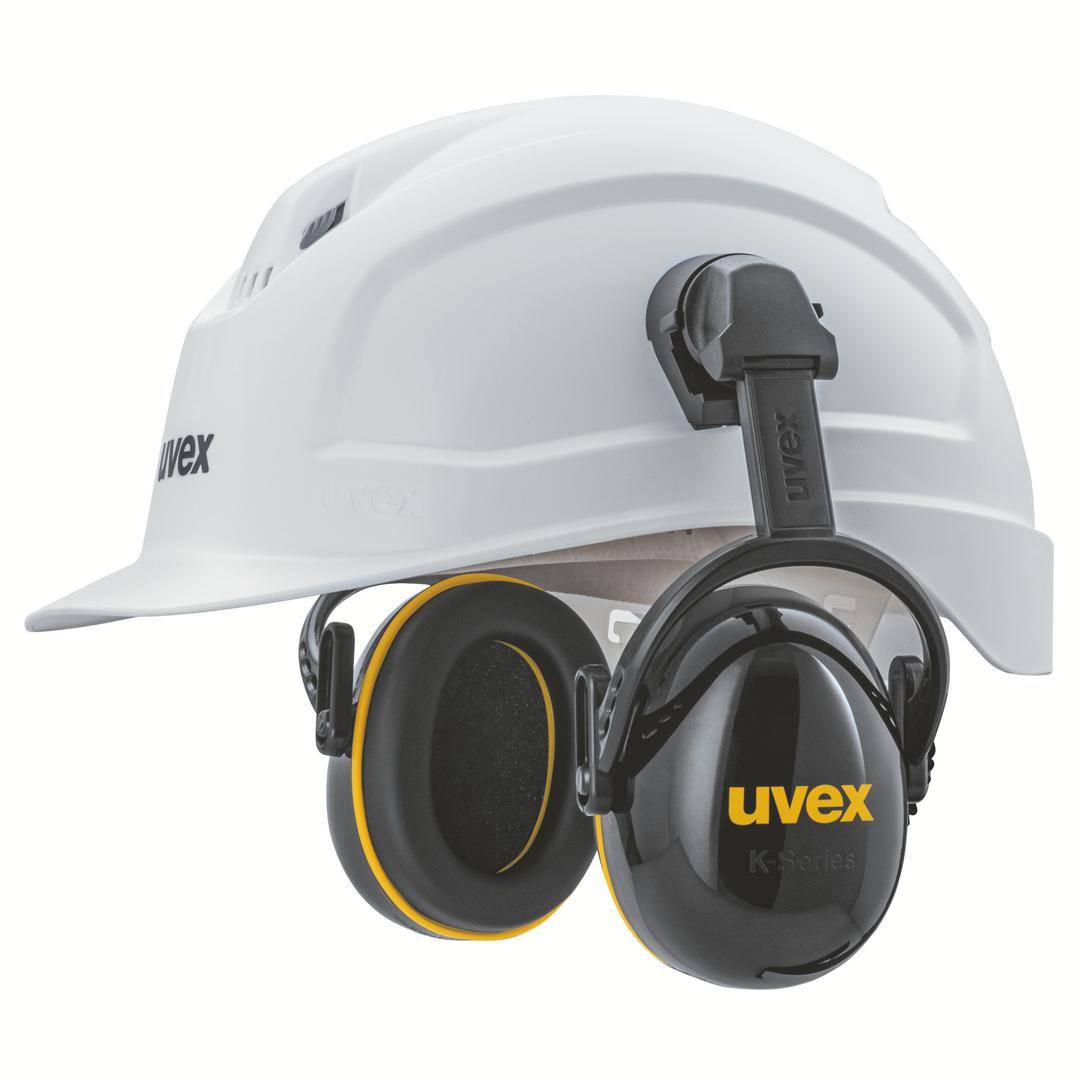 White safety helmet with black ear defenders with yellow trim from the Uvex brand. Suitable for workplace protection and safety.