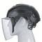 A black safety helmet with an integrated, transparent face shield, worn on a white model head.