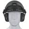 A white mannequin is wearing a safety helmet with an integrated visor and ear defenders. The helmet is black and provides comprehensive protection.