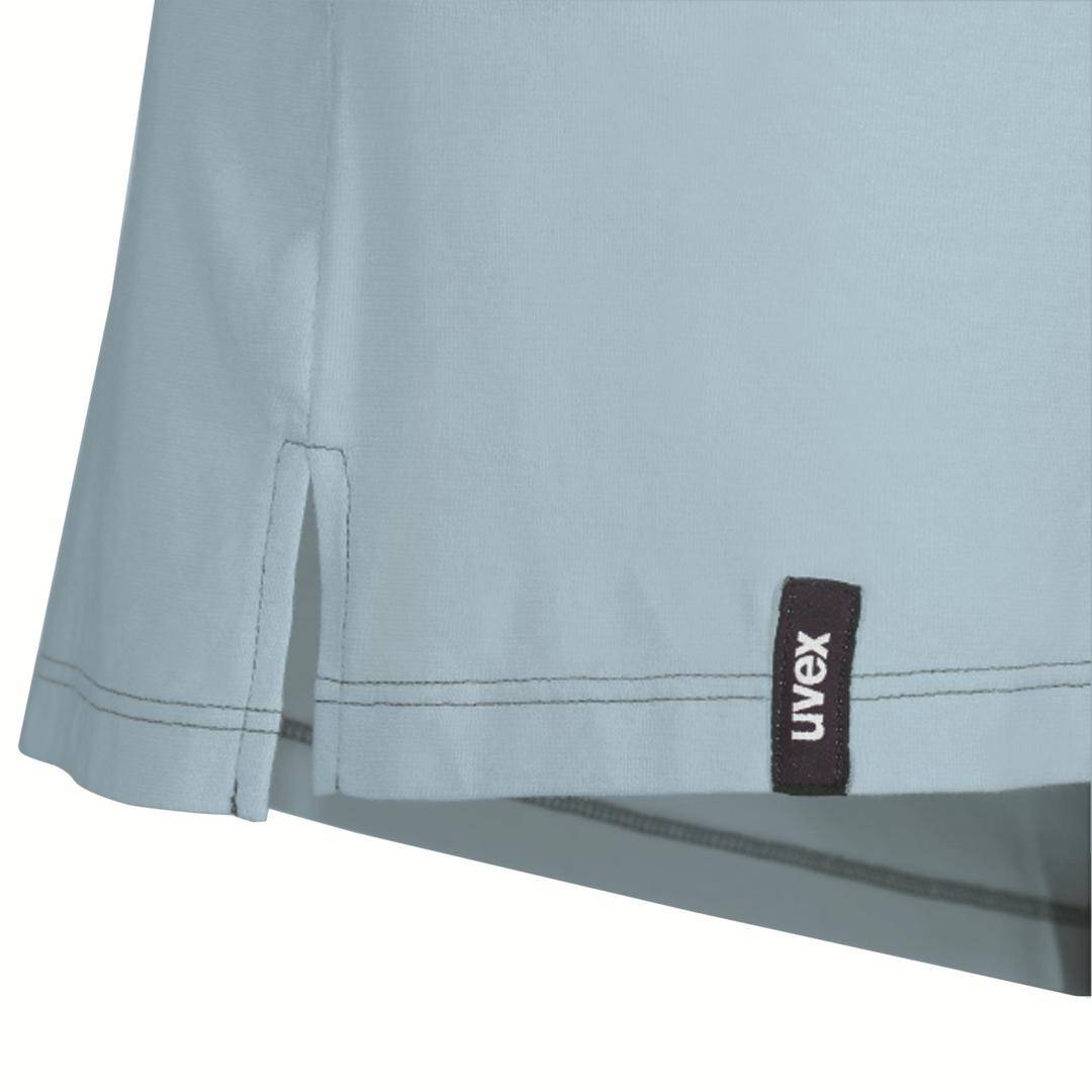 A grey garment with a small slit and a label reading 'uvex'.