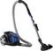A modern, black and blue vacuum cleaner with a slender, flexible hose and large wheels on a white background.
