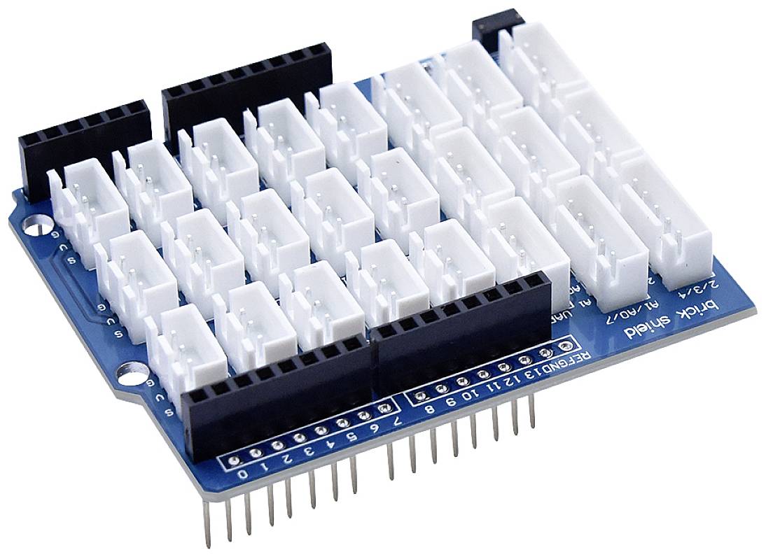 A blue breadboard with multiple white connective sockets, serving as an interface for electronic components.