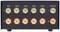 Rear side of an audio distributor with six AUX inputs and one AUX output. Each connection has points for left and right channels.