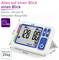 Blood pressure monitor with display showing systolic 128, diastolic 80, pulse 79. Labelled with dimensions and weight 224g.