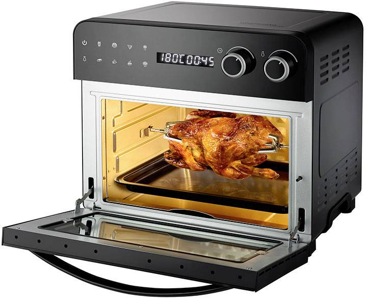 An open oven on the worktop with a roast chicken on a spit. The display shows 180 degrees Celsius and 45 minutes.