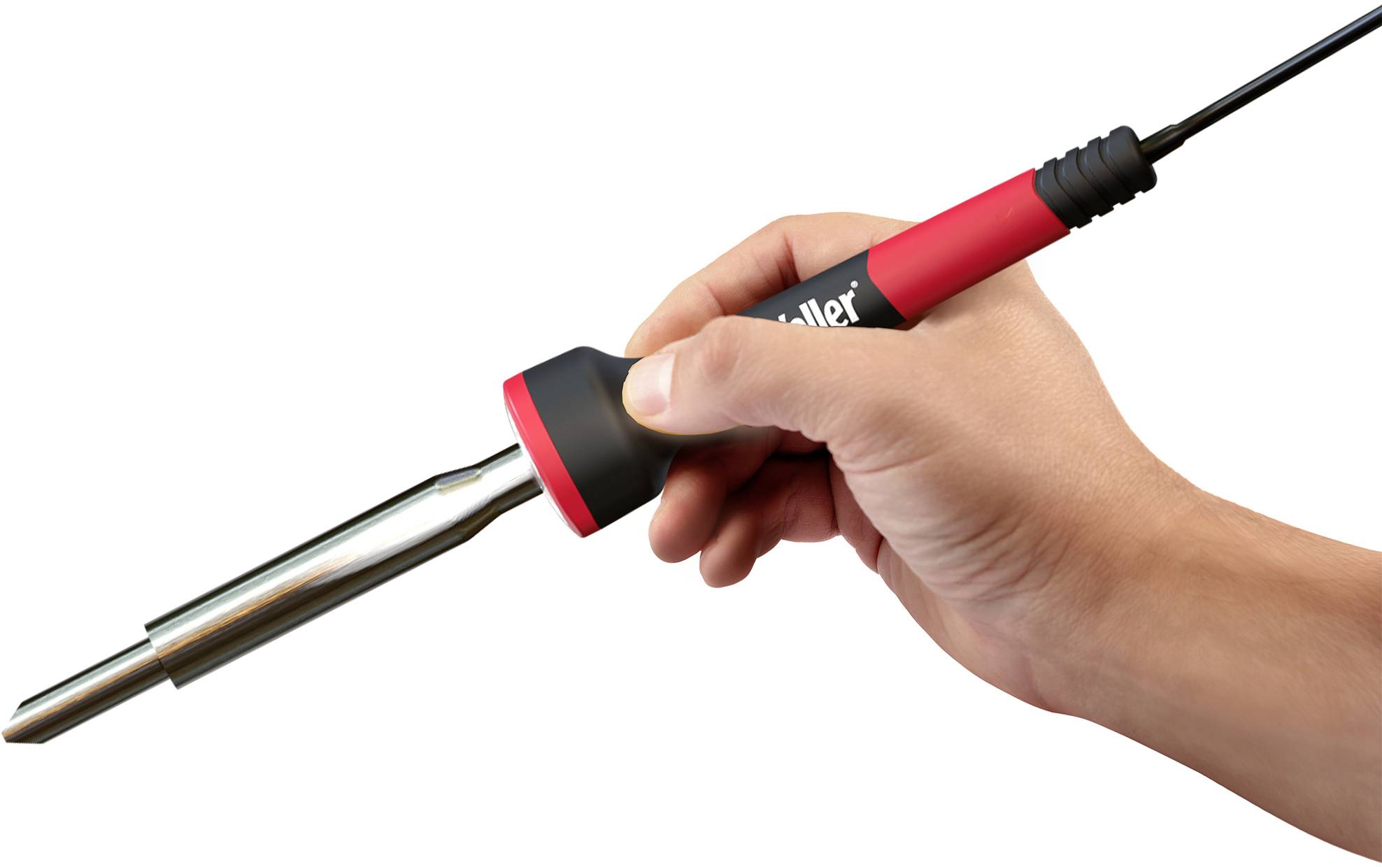 A hand is holding a soldering iron with a red handle. The soldering iron is made of metal and has a long, shiny heating element.