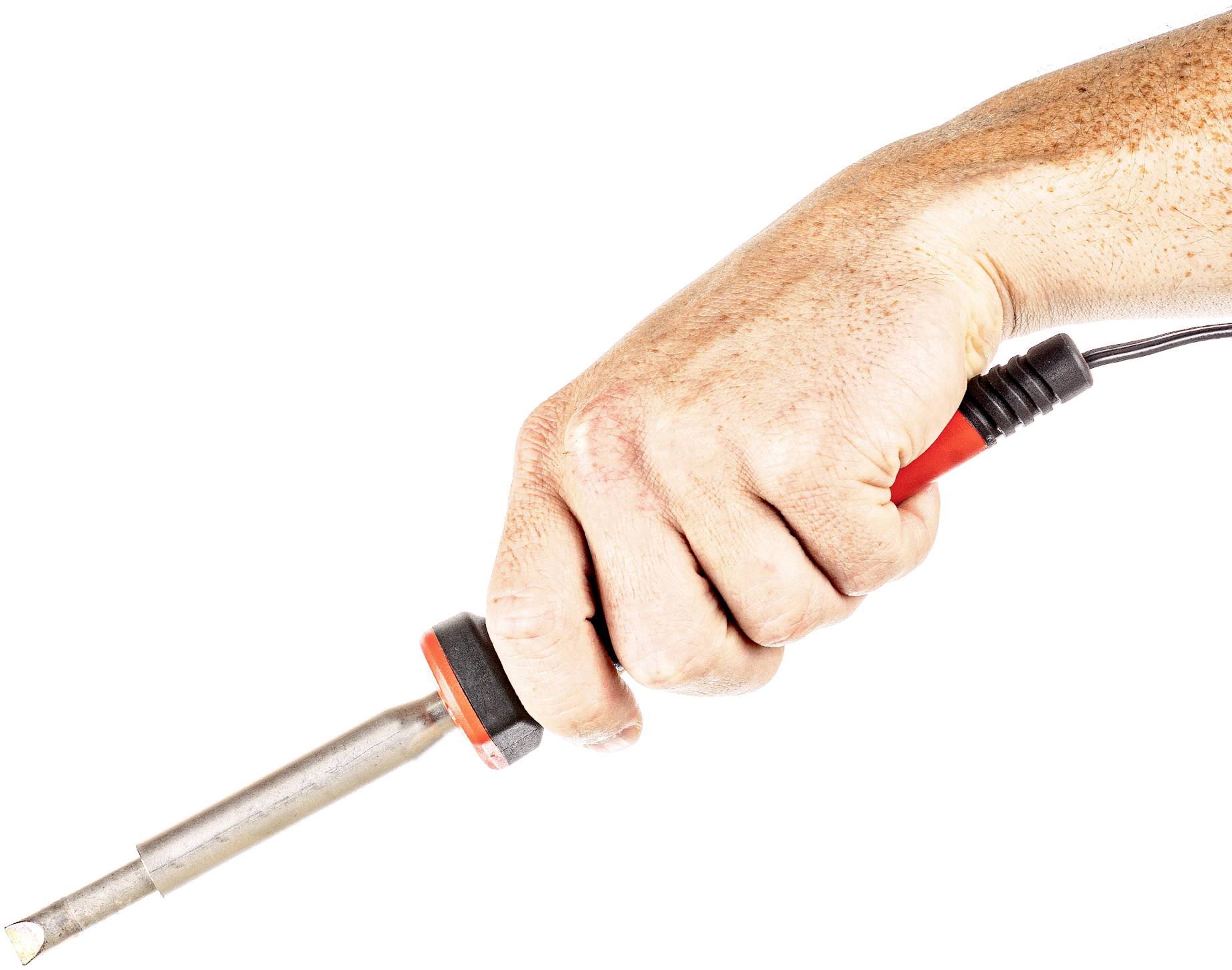 A hand is holding a soldering iron, ready to solder. The soldering iron has a black handle with a red tip.