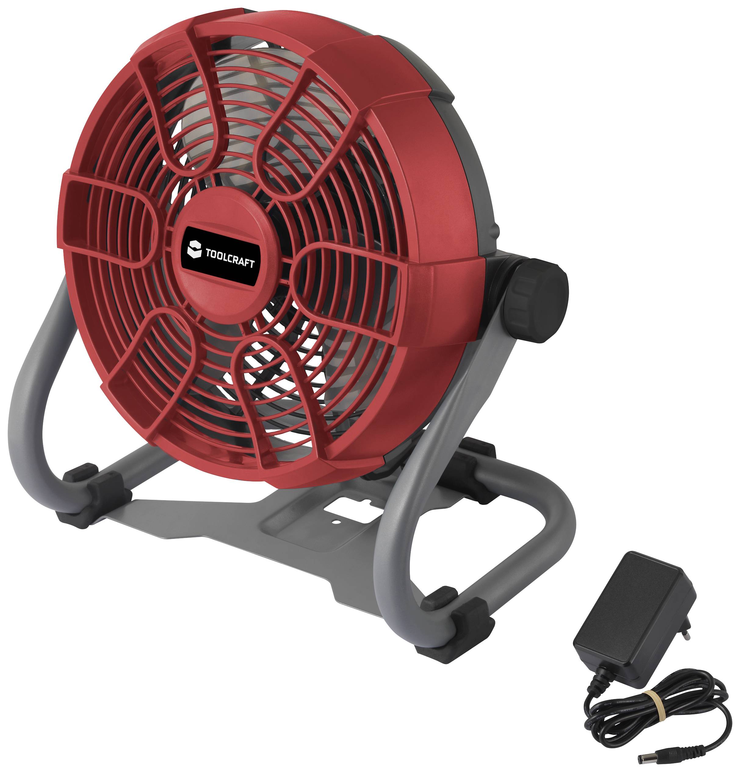 A red pedestal fan with a grey frame. A power cable lies beside it.