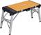 Folding work table with an orange worktop and silver legs. The table is portable, sturdy and height-adjustable.