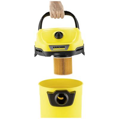 'A yellow KÄRCHER vacuum cleaner with its filter cover removed reveals the removable filter and the empty dust container.'