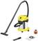 Yellow and black vacuum cleaner with accessories: floor and crevice nozzle, filter, and dust bag. Suitable for wet and dry cleaning.