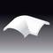White, curved plastic cover against a grey background. Used for fastening or protection in technical applications.