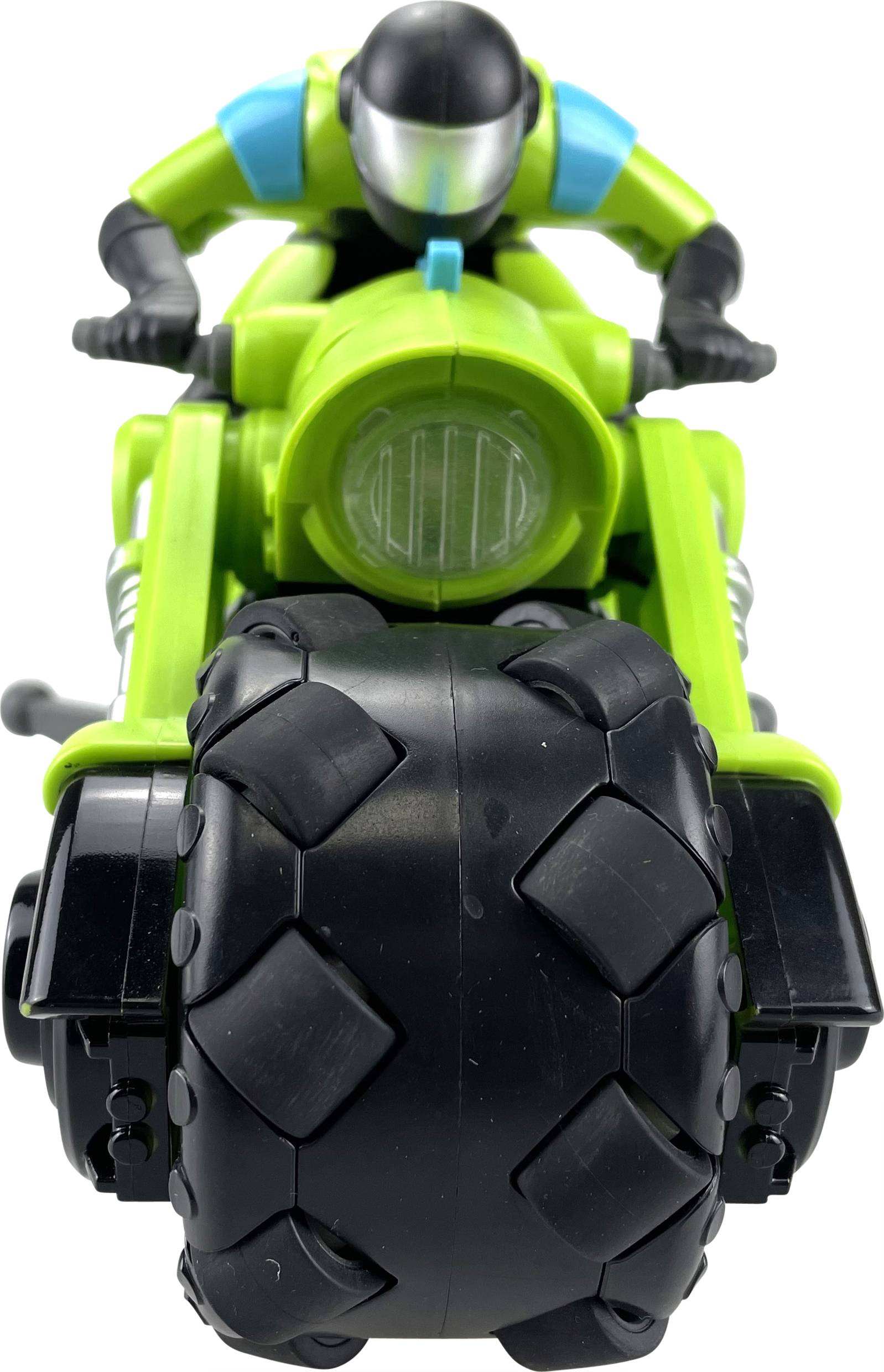 Green toy motorbike with a large front wheel, controlled by a black figure wearing blue and green protective clothing.