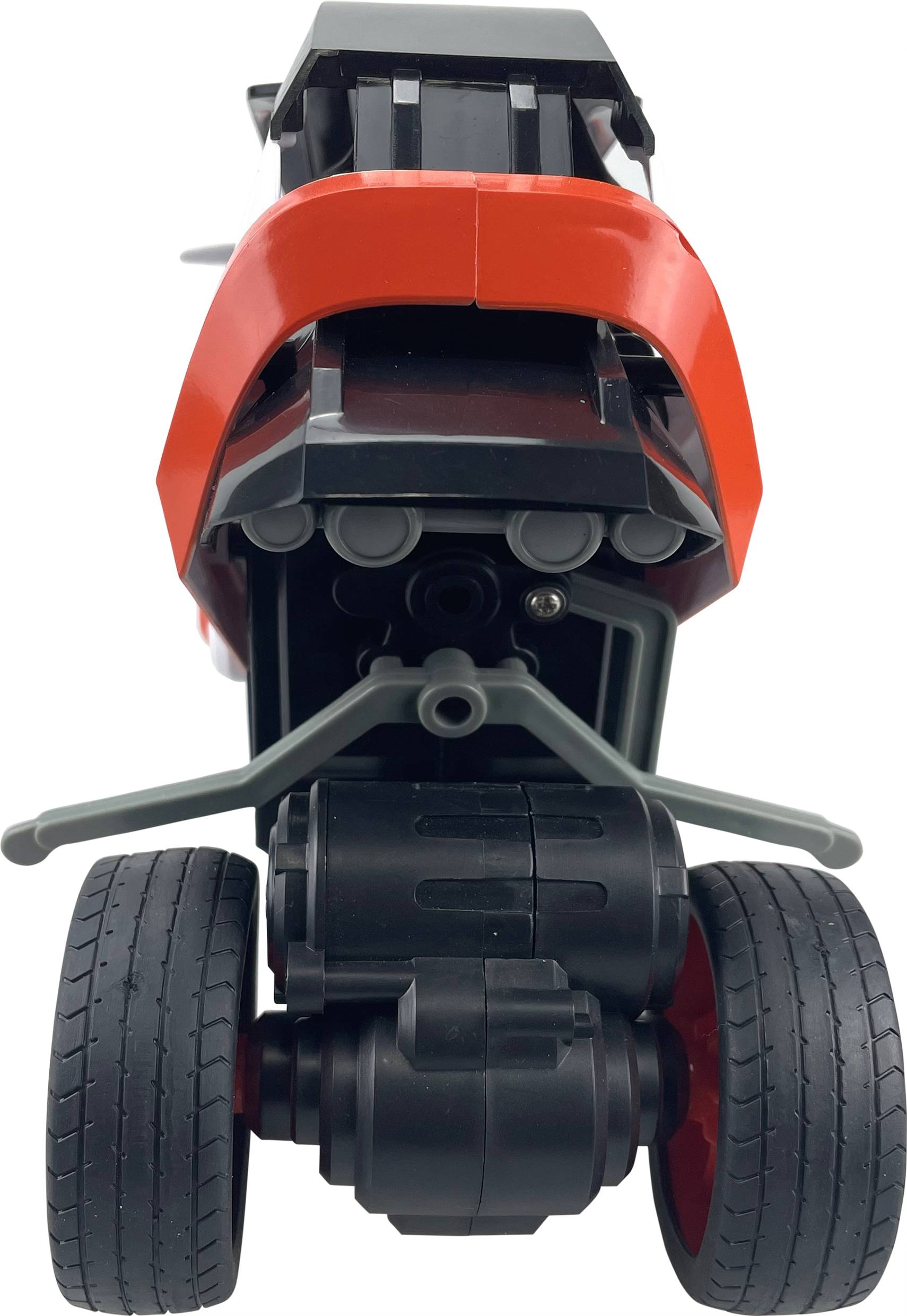Rear view of a red and black toy motorbike with thick tyres.